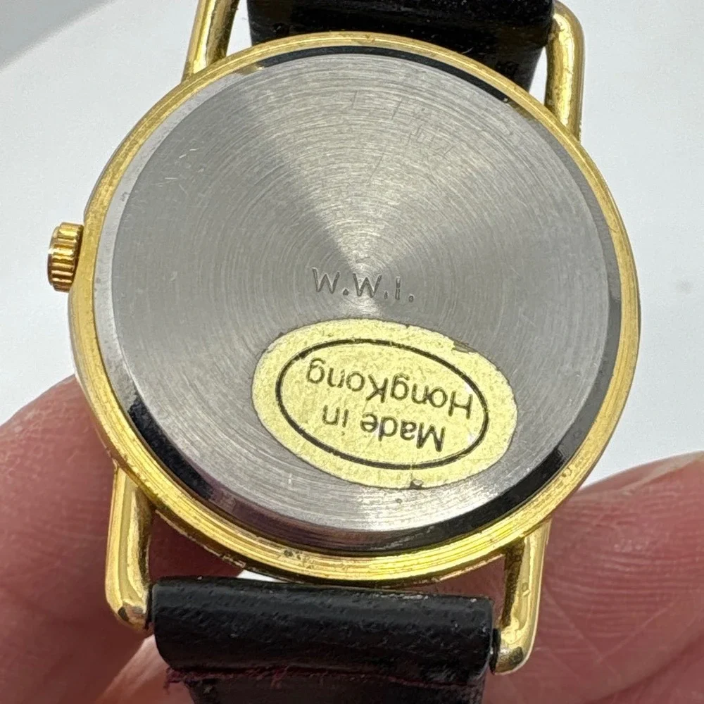 1980s Tali Beverly Hills Watch Rhinestone Accent Gold Tone Black‎ Face Quartz
